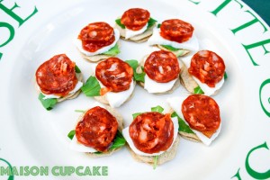 Easy chorizo canapes recipe with mini oatcakes, mozzarella and rocket