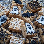 Halloween Marshmallow Squares decorated with cobwebs, ghosts and bats