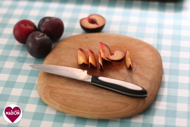 Cutting plums for plum and almond galettes, a Dead Easy Dessert by development.maisoncupcake.com using puff pastry, fresh fruit and nuts - ready in under 30 minutes #quick #easy #recipes