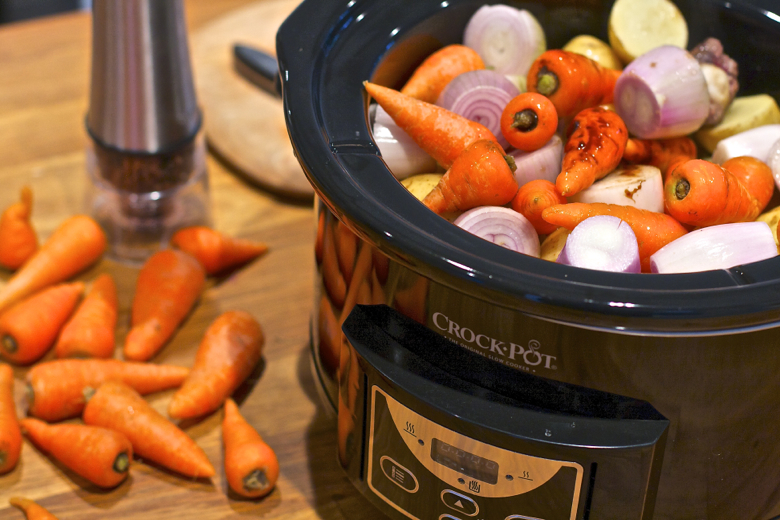 Crockpot Beef on the Bone Stew - root vegetables on top of slow cooker beef bones