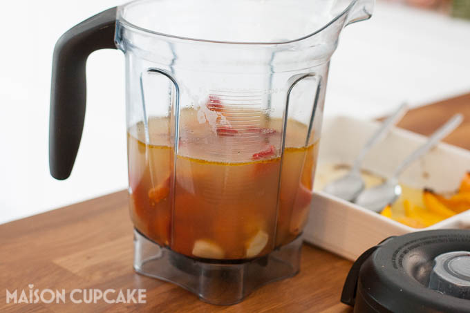 Ingredients for roast tomato and red pepper soup in a Vitamix power blender jug ready to be blended.