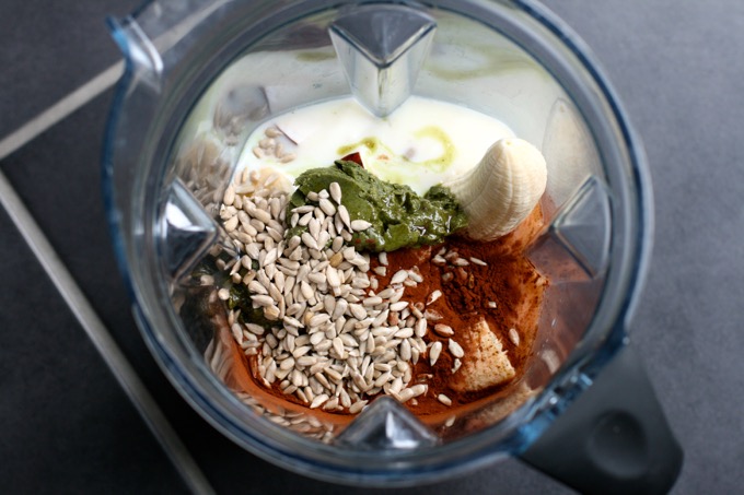 Dairy Free Chocolate Smoothie With Pumpkin Seed Butter made with reduced fat coconut milk and oats for a filling breakfast drink to start your day - ingredients in blender jug before mixing