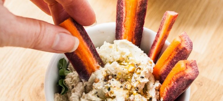 White bean bean dip with hummus and purple carrots