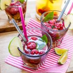 Quench your thirst this summer with this quick and easy refreshing cocktail mocktail idea - iced green tea fruit cup raspberry drink with lime and basil perfect for parties and barbecues