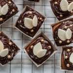 autumn cupcakes - with chocolate icing and white chocolate leaves and little gold edible balls