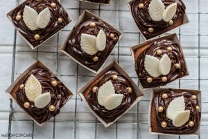autumn cupcakes - with chocolate icing and white chocolate leaves and little gold edible balls