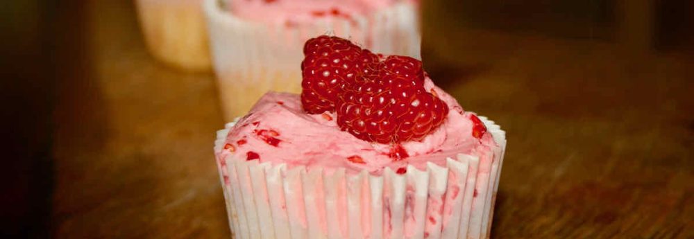 Crushed raspberry cupcakes with pink icing.